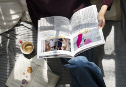 Woman sitting on couch looking at a magazine. Senior Session Timeline