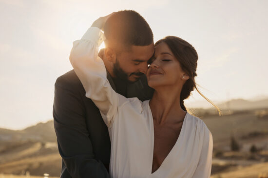 portrait of a couple at sunset